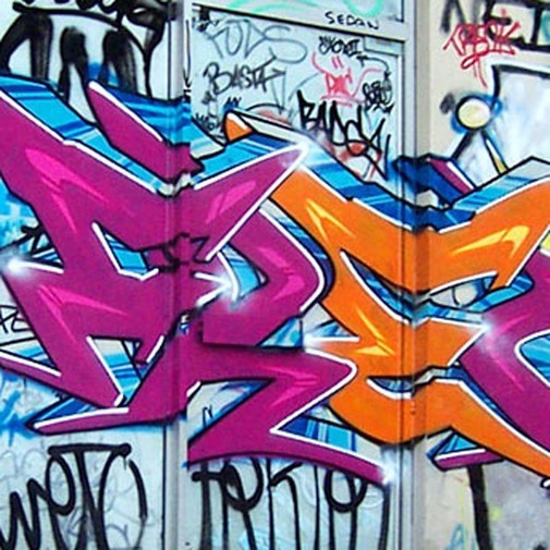 Urban Graffiti on a wall: BASTA SEDAN