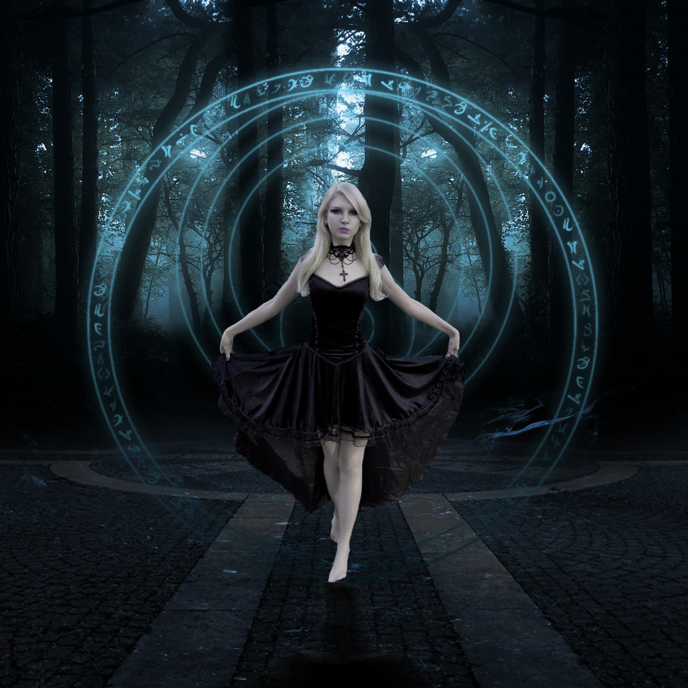 Beautiful Gothic woman in a dark forest